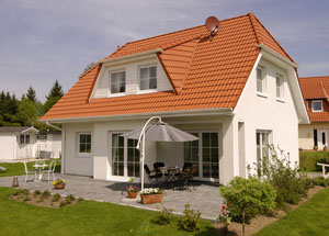 Une maison avec une terrasse en béton peut être esthétique